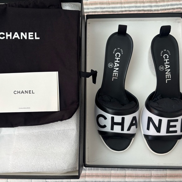 CHANEL Shoes - CHANEL Black & White Logo Slide Mules